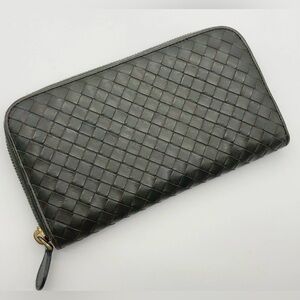 Bottega Veneta dark green authentic zippy Woven leather Wallet